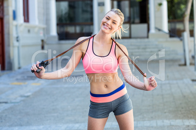 A pretty woman with jumping rope
