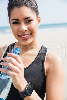 Fit woman wearing smart watch