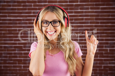 Portrait of a young hipster listening to music