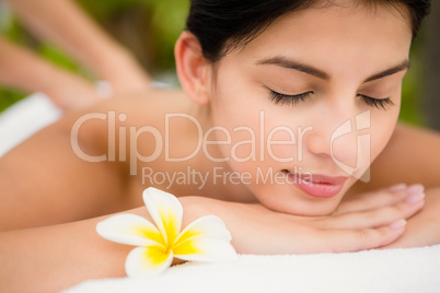 Attractive woman receiving back massage