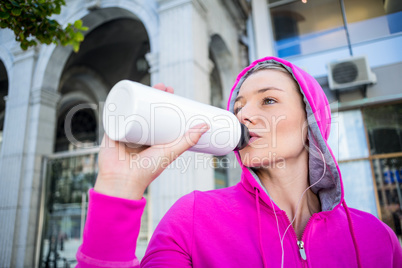 A beautiful woman drinking water