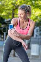 A beautiful athlete using her phone