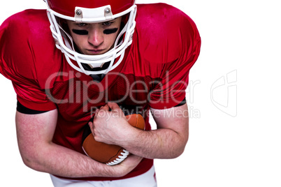 American football player running with the ball