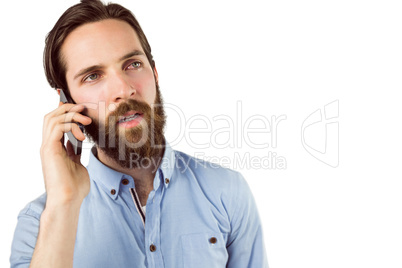 Handsome hipster making a call