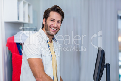 Portrait of smiling cashier