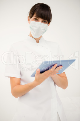 Portrait of a nurse using her digital tablet Portrait of a nurse using her digital tablet