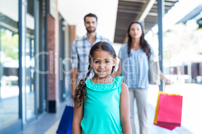 Happy family with shopping bags