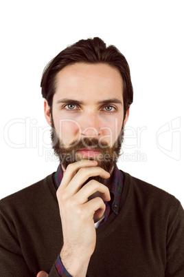 Hipster thinking with hand on chin