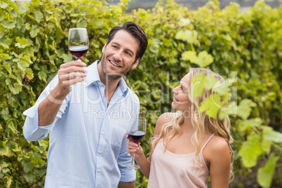 Young happy couple talking about wine