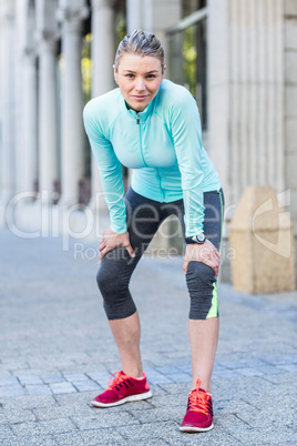 A beautiful athlete posing