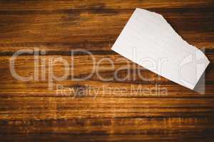 Scrap of paper on wooden table