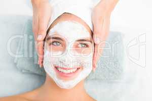 Attractive woman receiving treatment at spa center