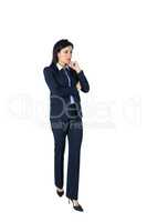 Brunette businesswoman thinking with hand on chin