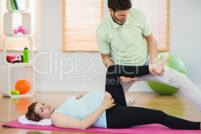 Pregnant woman getting relaxing massage