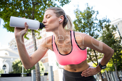 A beautiful woman drinking water