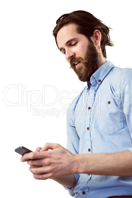 Stylish hipster sending a text