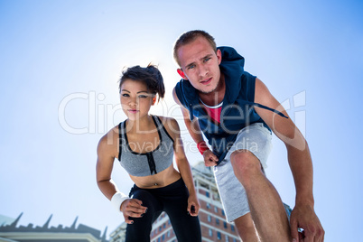 Portrait of a couple preparing to parkour