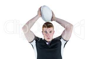 Rugby player about to throw a rugby ball