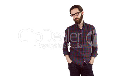 Handsome hipster with hands in pockets