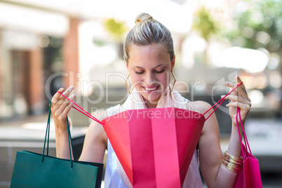 Woman looking into her bag