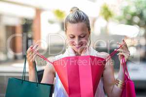 Woman looking into her bag