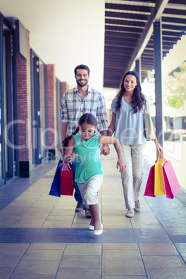 Happy family with shopping bags