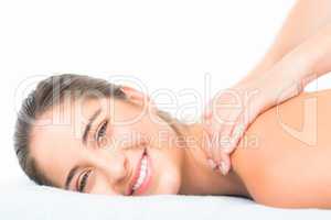 Beautiful smiling of pretty woman on massage table