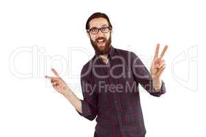 Handsome hipster showing peace sign