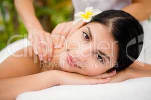 Attractive woman receiving back massage