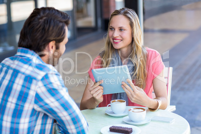 Couple looking at the tablet