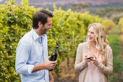 Young happy couple smiling at each other