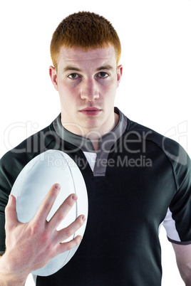 Rugby player holding a rugby ball