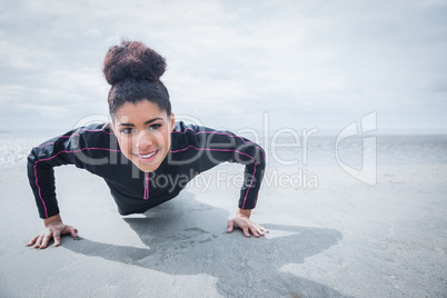 Fit girl working out on cold day