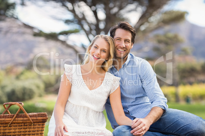 Cute couple on date looking at the camera