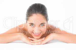 Portrait of a beautiful brunette enjoying a salt scrub treatment