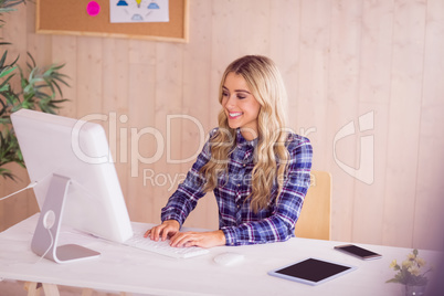 Pretty casual worker at her desk