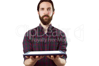 Handsome hipster showing tablet pc