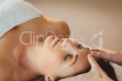 Young woman having a reiki treatment