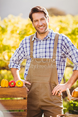 Cheerful farmer with hands on hips