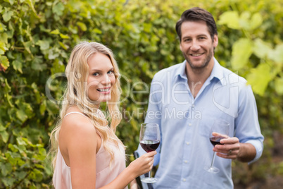 Young happy couple smiling at camera Young happy couple smiling at camera