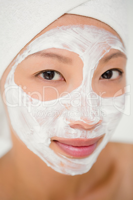 Attractive woman with cream treatment