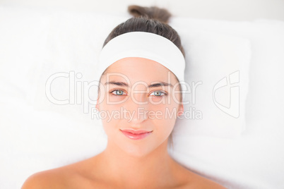 Beautiful young woman on a massage table