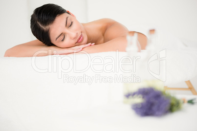 Beautiful woman lying on the massage table