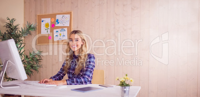 Pretty casual worker at her desk