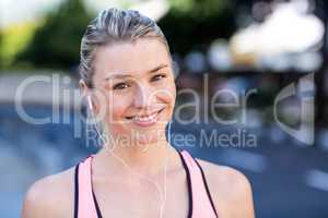 Portrait of beautiful athlete smiling