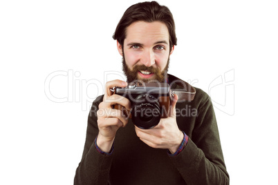 Hipster using his vintage camera