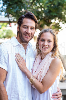 Smiling couple embracing