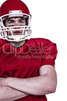 American football player with arms crossed