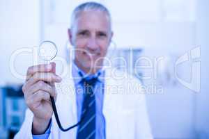 Doctor holding up his stethoscope