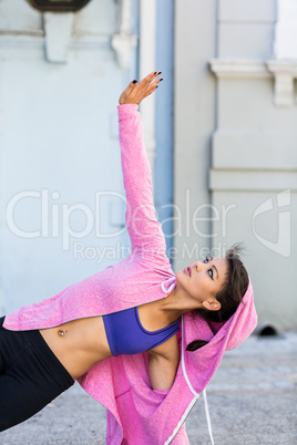 Athletic woman exercising side plank